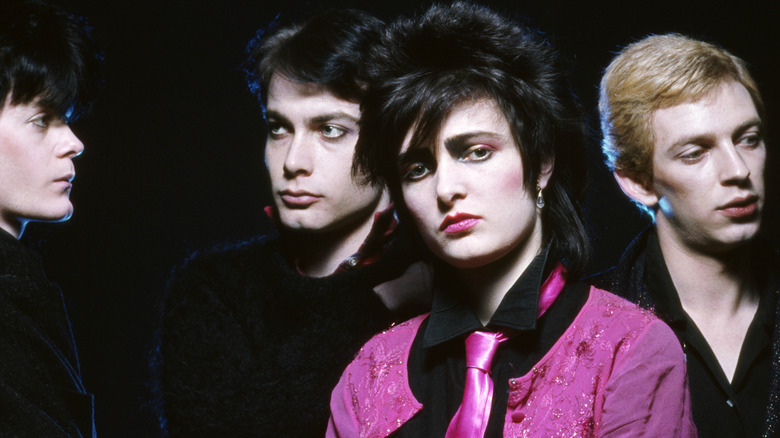 Siouxsie and the Banshees posing in a promo photo.