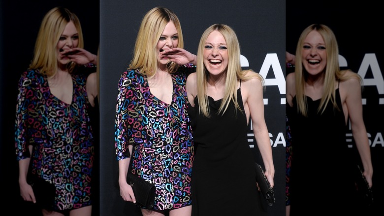 Dakota Fanning in a leopard-print dress and Elle Fanning in a black dress
