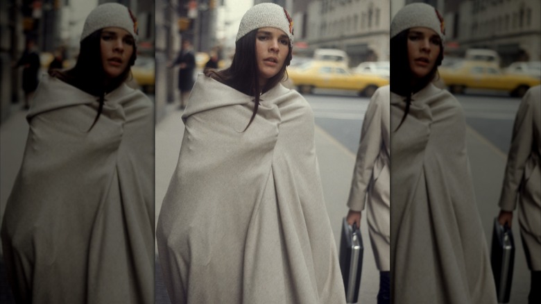 Ali MacGraw wrapped in a blanket and wearing a stocking hat in New York City in 1970.