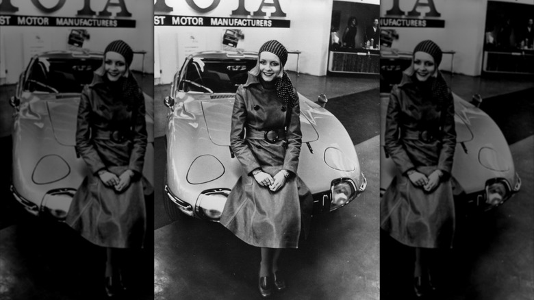 Twiggy, sitting on a Toyota 200 GT car February 1968