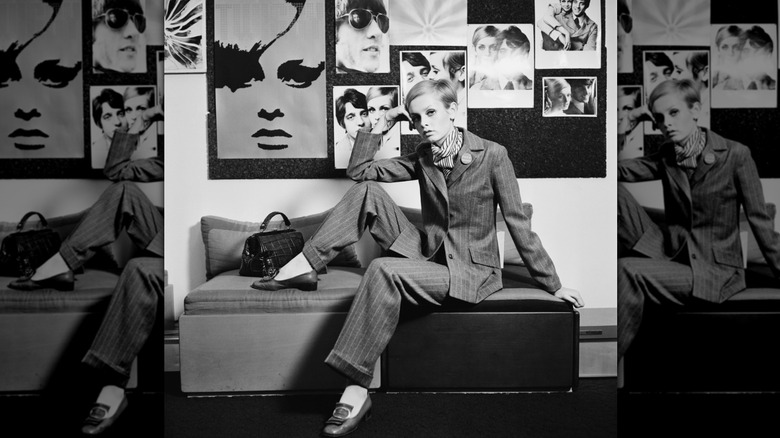 Twiggy posing in a suit in London, May 1967