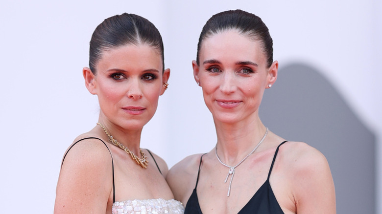 Kate Mara and Rooney Mara posing on the red carpet at the 
