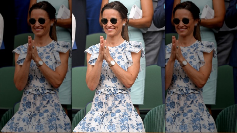 Pippa Middleton wearing a blue-and-white floral dress at Wimbledon in 2019.