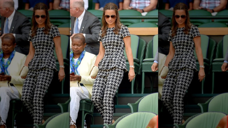 Pippa Middleton wearing a black-and-white pattern peplum top and matching pants at Wimbledon in 2015.