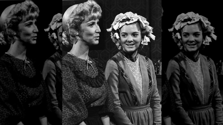 Charlotte Stewart and Alison Angrim preparing to film a scene for "Little House on the Prairie."