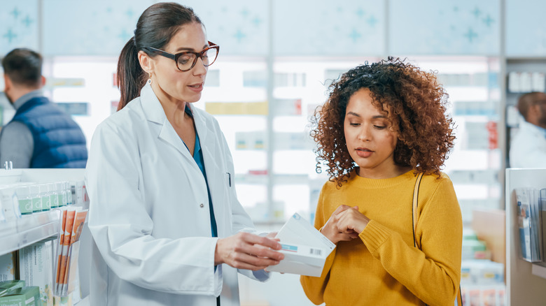 pharmacist explaining meds