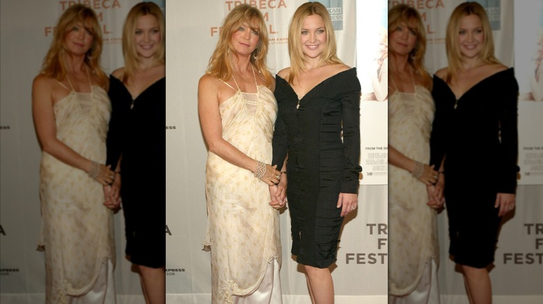 Goldie Hawn and daughter Kate Hudson hold hands at Tribeca Film Festival