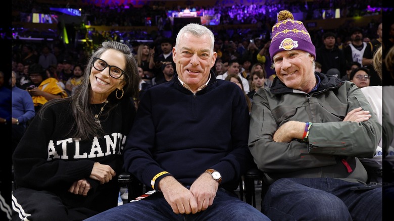 Jami Gertz and Tony Ressler posing with Will Ferrel