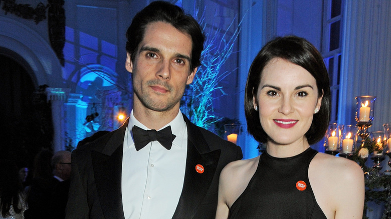 John Dineen and Michelle Dockery at a gala in 2013.