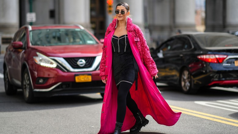 woman wearing maxi coat