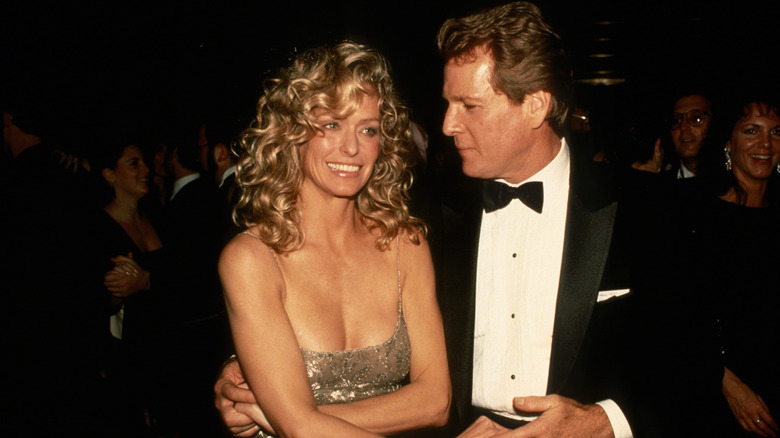 Farrah Fawcett and Ryan O'Neal are photographed together at a black tie event
