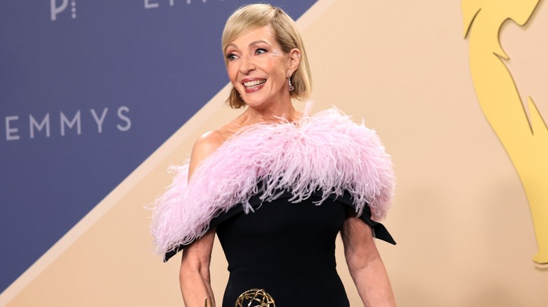 Allison Janney smiling while posing at the 2026 Emmy Awards.