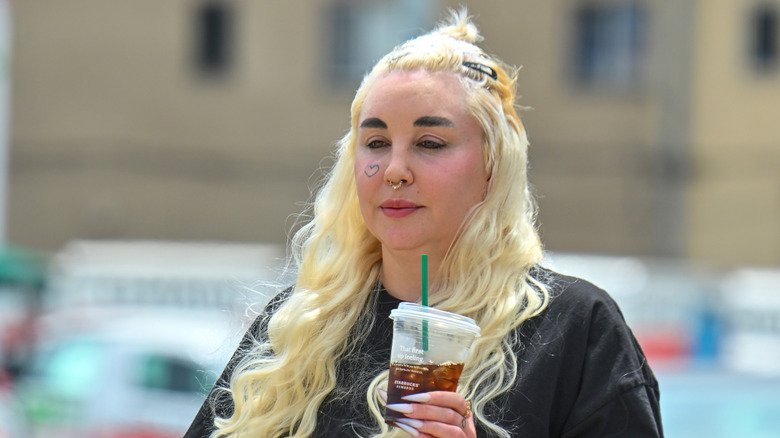 Amanda Bynes drinking coffee