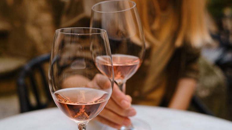 Woman holding wine glass
