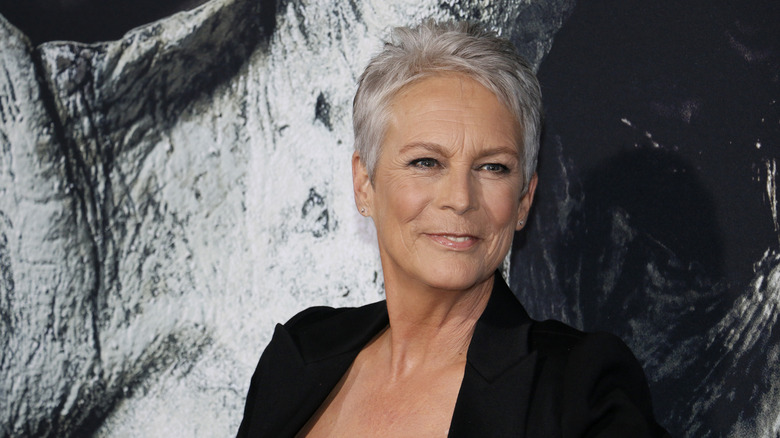 Jamie Lee Curtis posing in a pixie cut