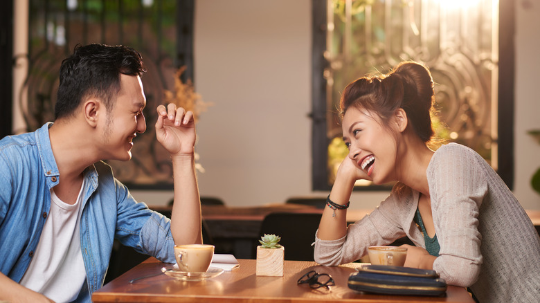 Couple laughs on date