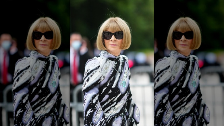 Anna Wintour with blonde hair wearing sunglasses