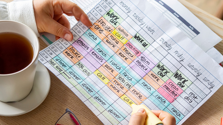 Woman with busy calendar schedule