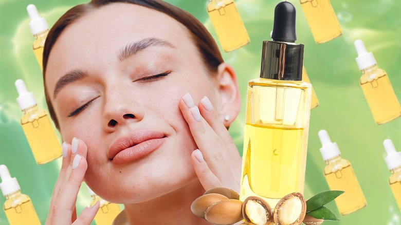 smiling woman applying argan oil