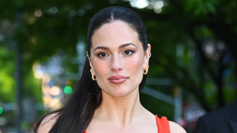 Ashley Graham poses for a photo wearing a red dress at the New York City Ballet Spring Gala