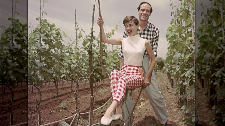 Audrey Hepburn and husband Mel Ferrer at a vineyard in Italy circa 1955