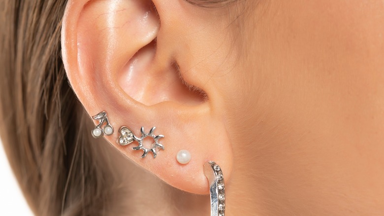 Ear with an auricle piercing