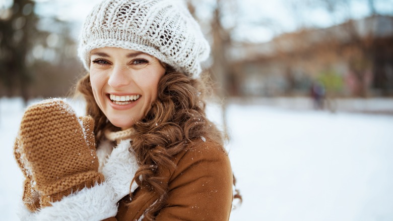 woman in snow with healthy hair
