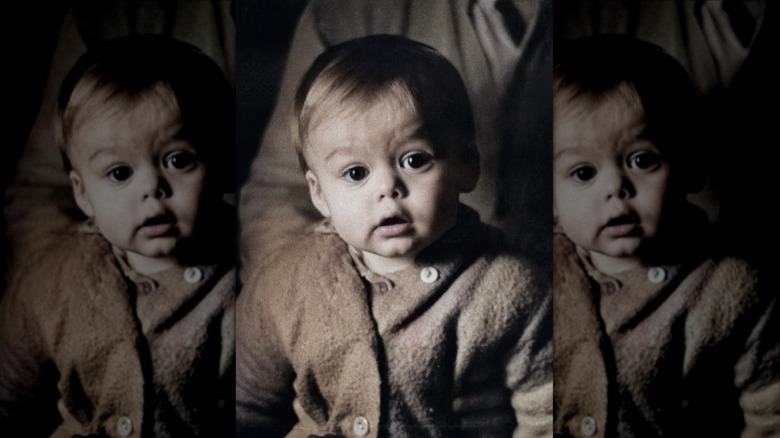 Vintage picture of a baby in a sweater