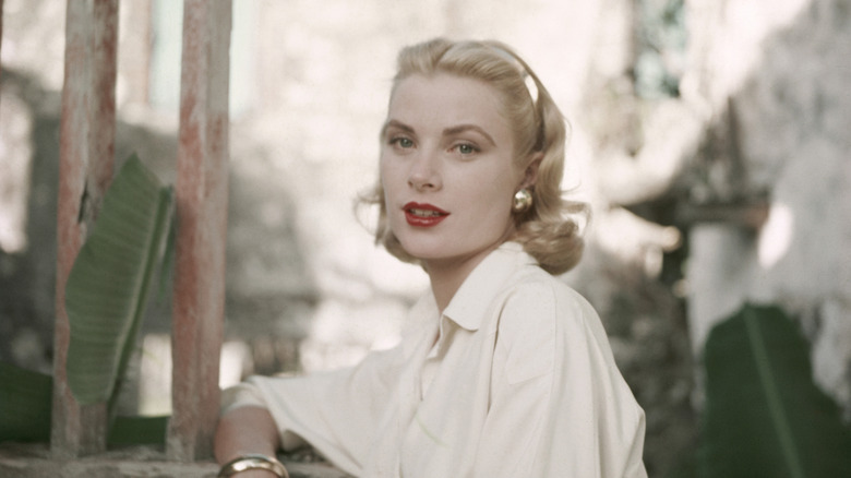 Grace Kelly with dark red lipstick and vintage curls
