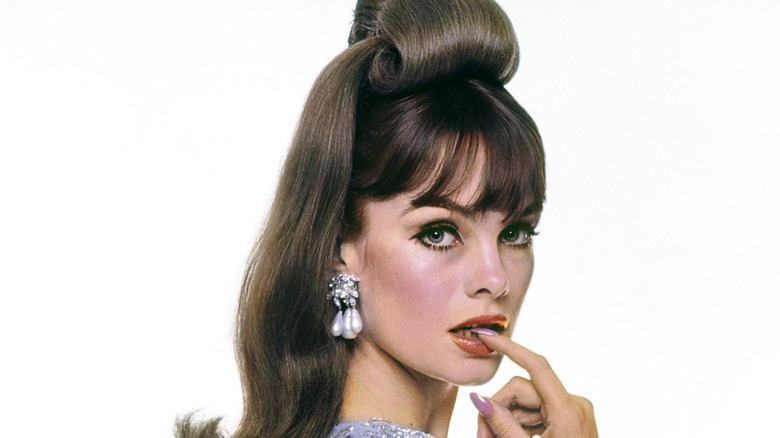 Jean Shrimpton modeling with a big updo in the 1960s