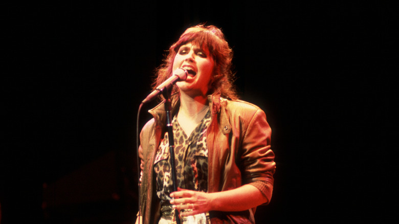 Linda Ronstadt performing on stage in 1981