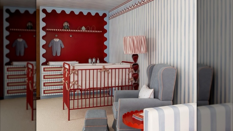 Blue and red baby nursery with gray accents
