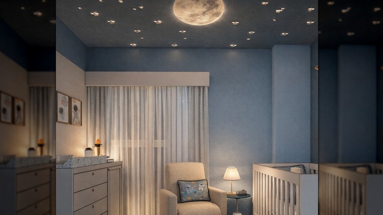 Blue nursery with lit ceiling