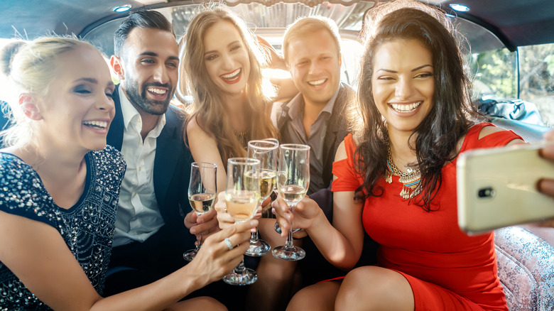 A group of people in a limo