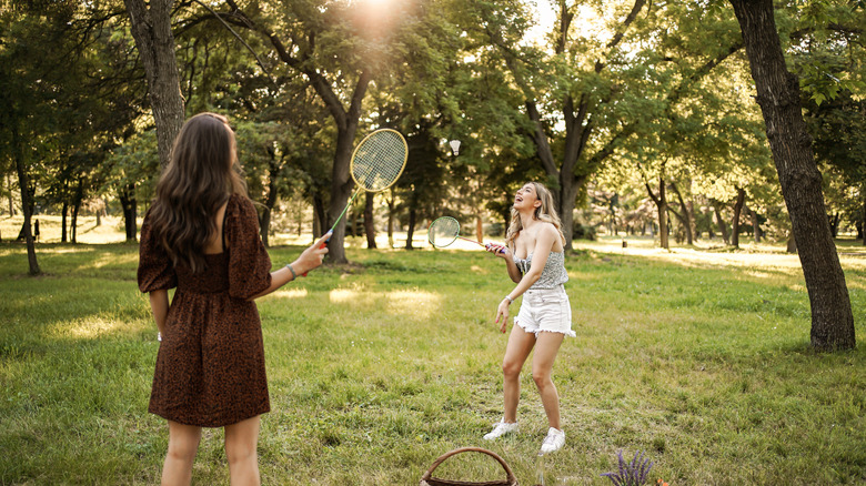Friends playing badminton