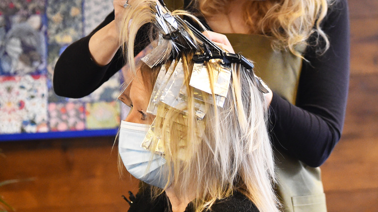 Woman getting her hair done