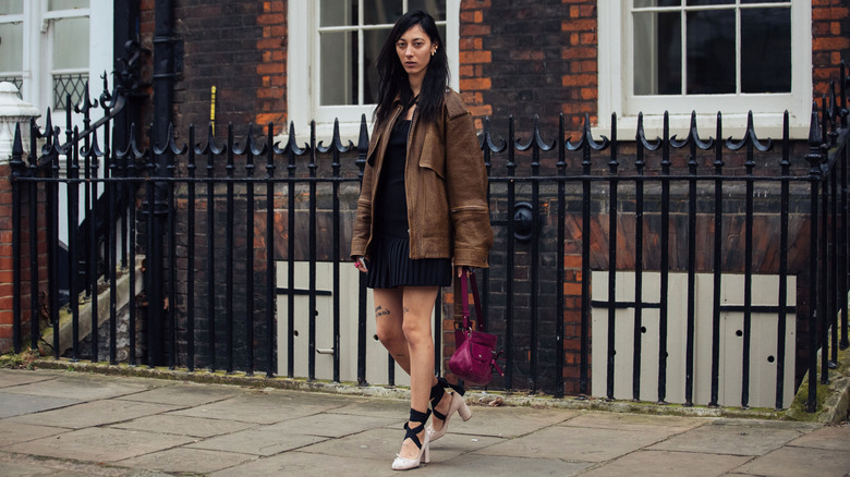 woman wearing pink ballet heels