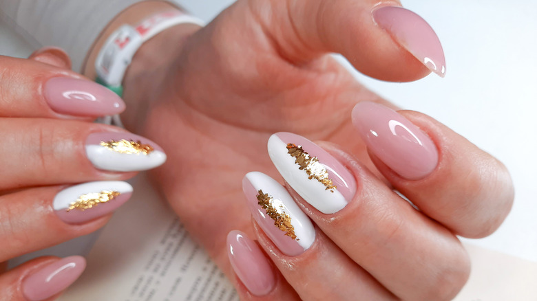 Pink metallic manicured nails 