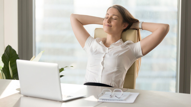 person relaxing while working