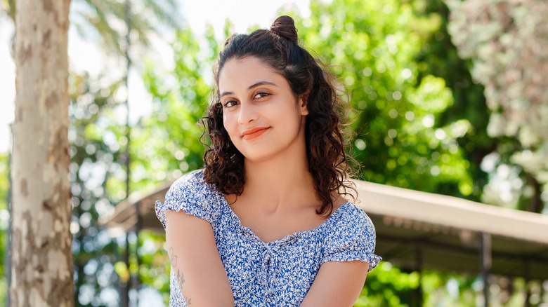 woman outside with curly hair