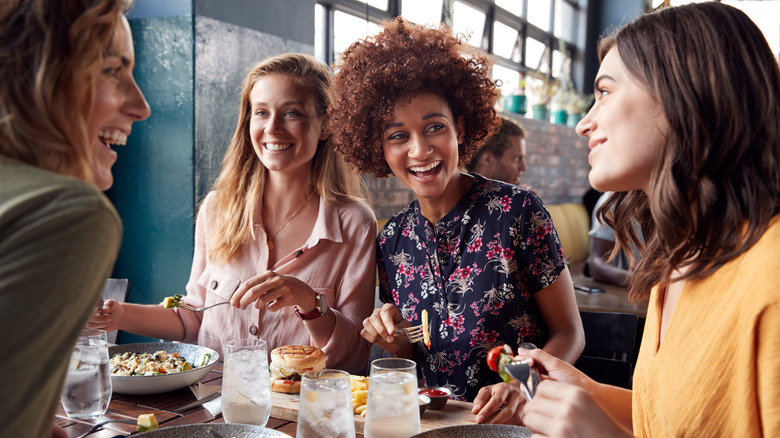 friends eating at restaurant