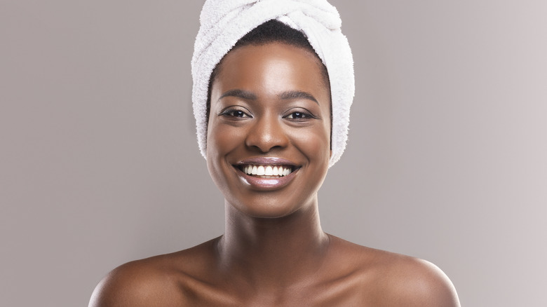 Woman smiling after her shower