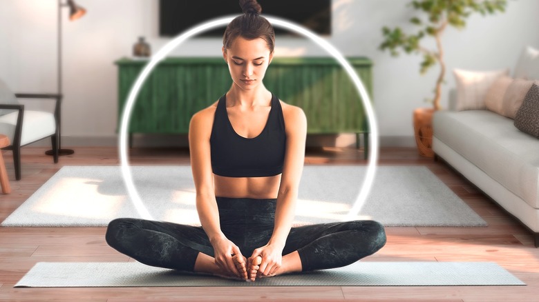 Woman doing butterfly stretch