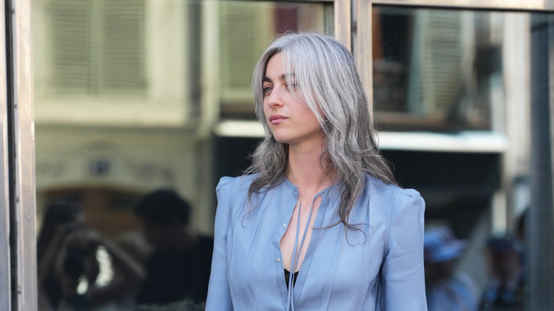 A woman with reverse ombré gray hair