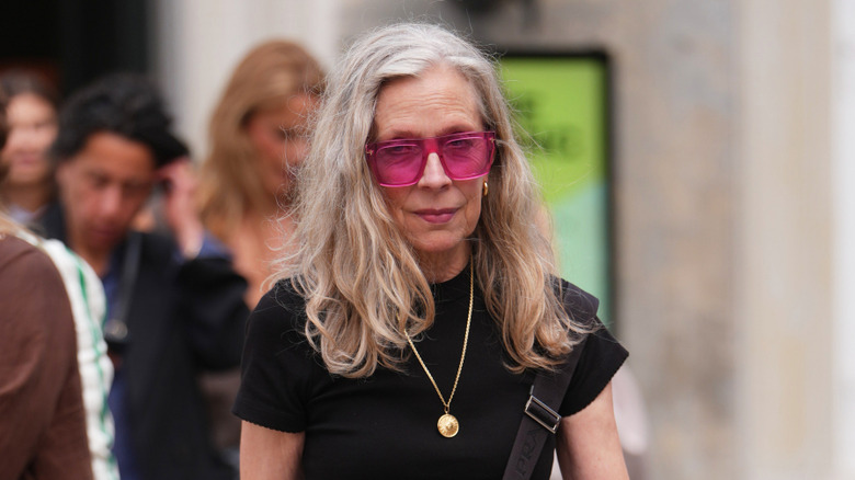 A woman with gray hair and blond sections at the front