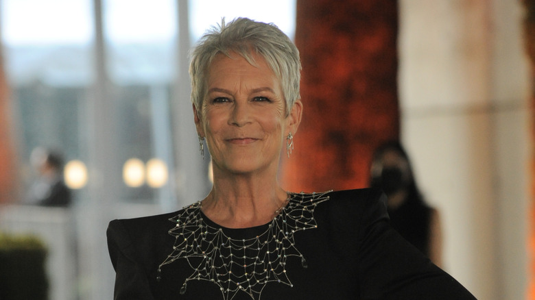 Jamie Lee Curtis poses with gray hair