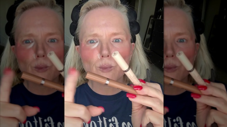 Woman holding Patrick Ta Sculpting Stick