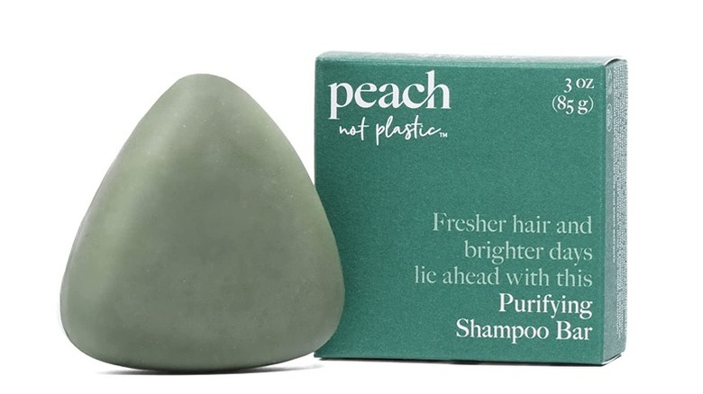 Green triangular bar of shampoo