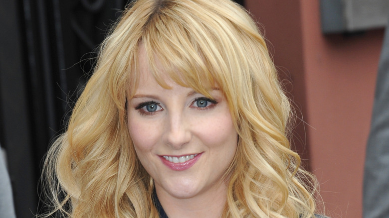 Melissa Rauch wearing a blue jacket