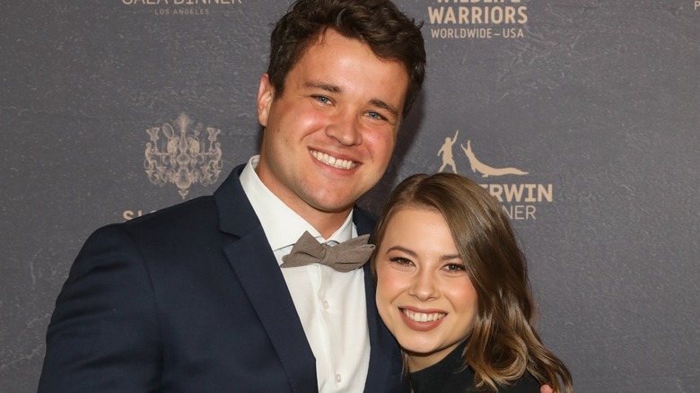 Bindi Erwin and husband Chandler Powell pose together in black tie attire for the 2023 Steve Irwin Gala Dinner in Beverly Hills.
